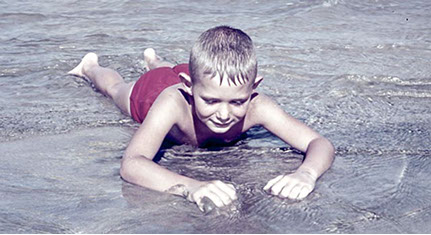 Boy in surf.